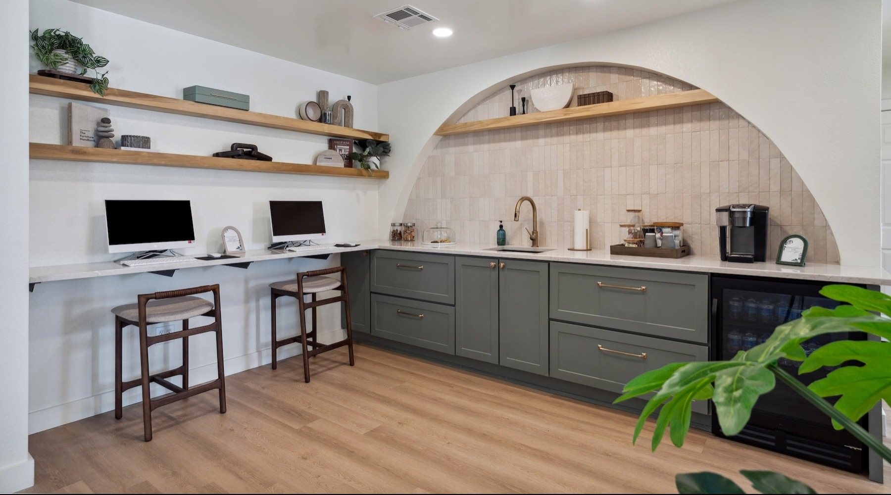 a clubroom with computers and a coffee bar