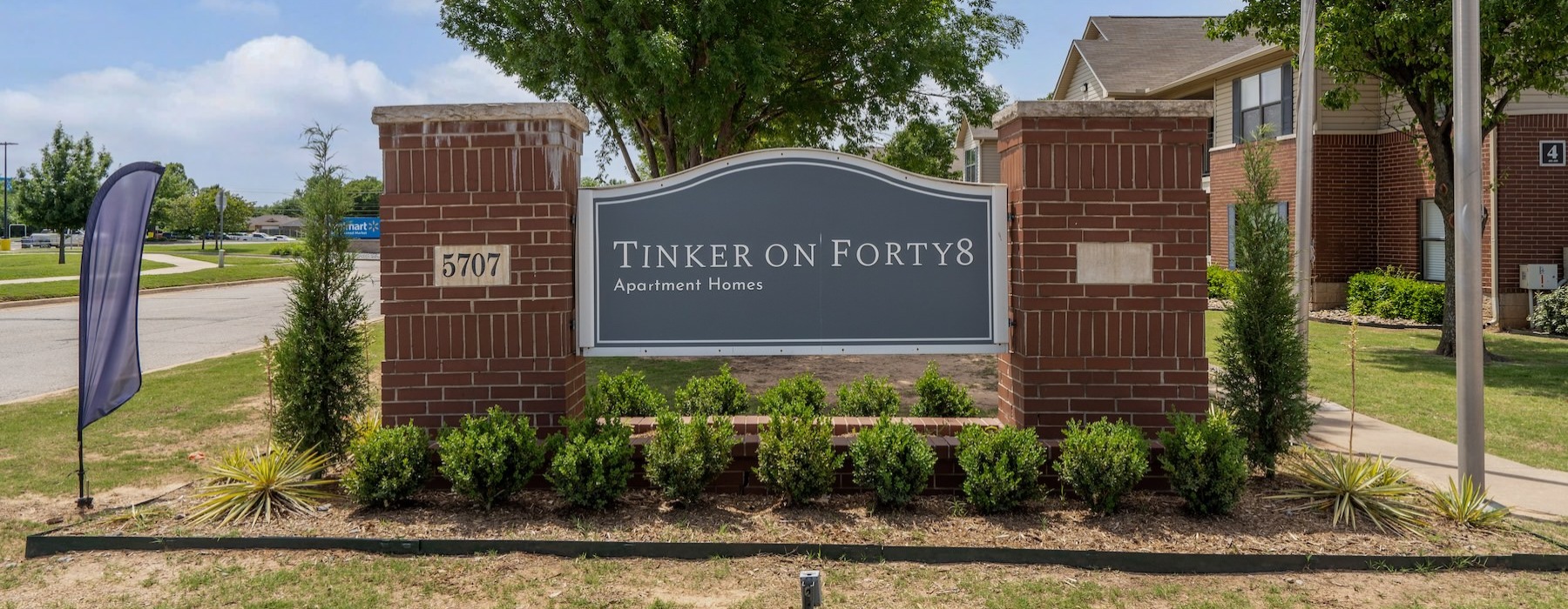 a sign in front of a building